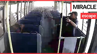 Astonishing footage from inside school bus shows passengers' miracle escape during crash