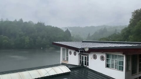 Rain over Strandul Lacul Ursu with a view over the saltwater lake Ursu in Romania