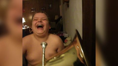 Boy Scares Brother With Tuba