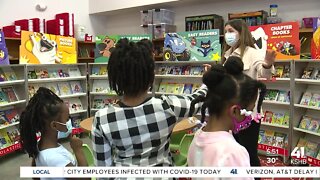 Students receive free books at book fair