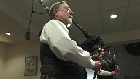 MacKenzie Highlanders' Pipe Band tuning up for a fund-raiser