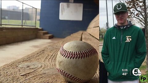 Baseball player Kyle Hlucky (17) suffers sudden cardiac arrest after sliding to third base