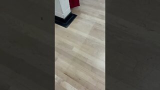 Dirty finish removal from wood floor with water, pad and oscillating unit