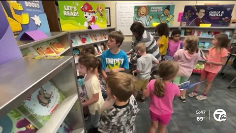 Generous donor gifts hundreds of books to elementary school students in wife's honor