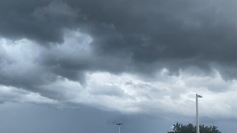 Storm front rolling over as I wait in the school car pool line