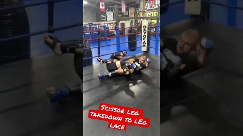 Scissor Leg Takedown off a side kick to leg lace