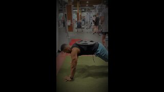 push-ups with one plate