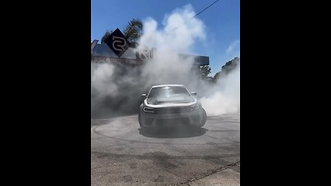 Dodge charger doing an incredible burnout