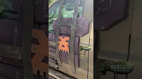 Ukrainian pick up covered in body armor plates