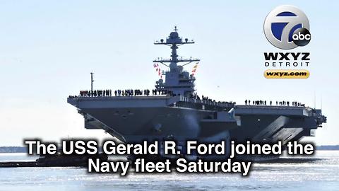 Trump helps commission $12.9B aircraft carrier USS Gerald R Ford