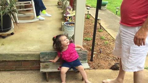 A Tot Girl Pulls Off A Practical Joke On Her Grandpa