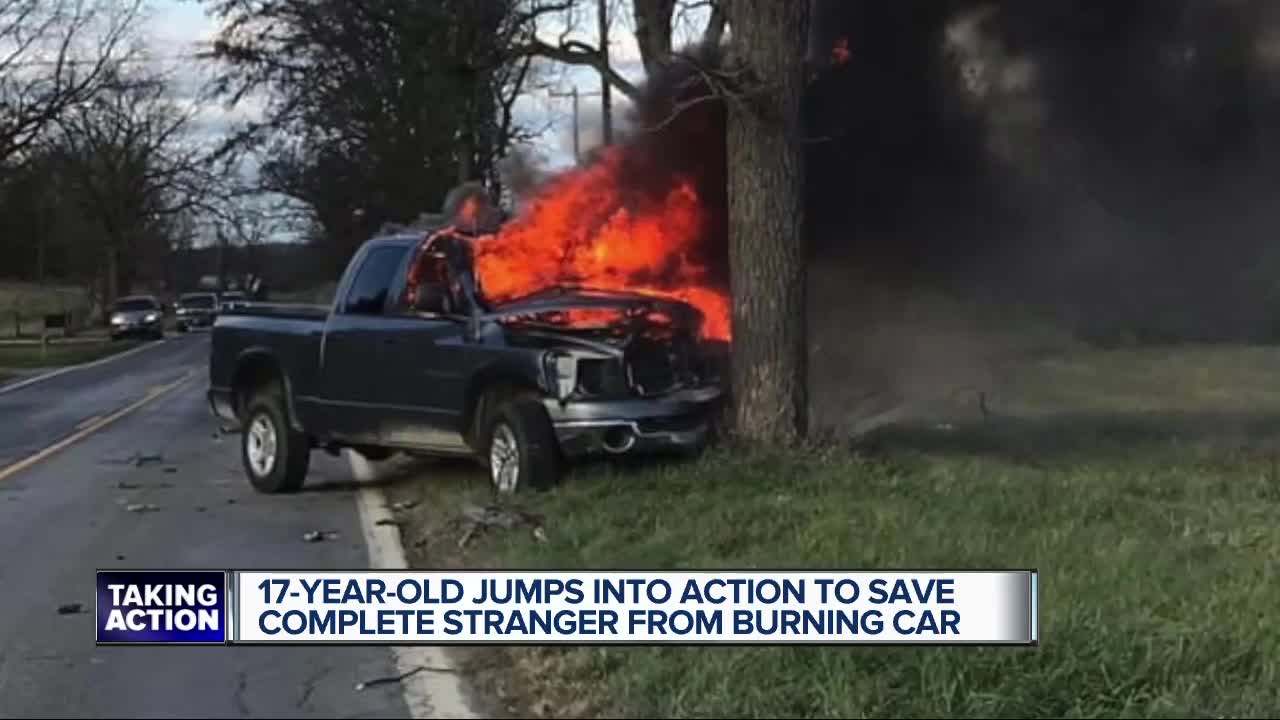 17-year-old jumps into action to save complete stranger from burning car