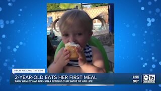 Valley 2-year-old eats her first meal