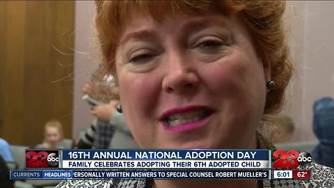 Family celebrates their 6th adopted child