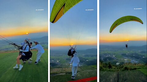 Paragliding seeing sunrise from sky