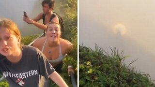 Mesmerizing full circle rainbow on the Stairway to Heaven in Hawaii