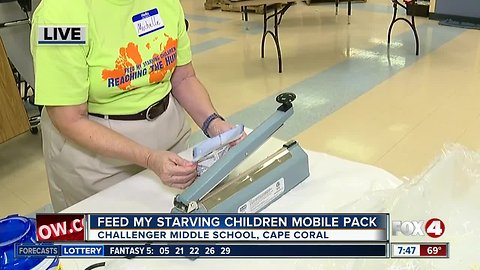 Feed My Starving Children holds mobile meal pack at Challenger Middle School