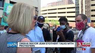 Omaha Mayor Jean Stothert talks with protesters