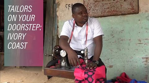 This guy fixes clothes door-to-door in the Ivory Coast
