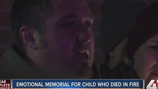 Emotional memorial for child who died in fire