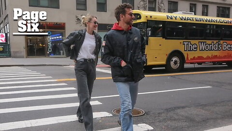 Gigi Hadid and Bradley Cooper flash huge smiles while strolling through NYC together