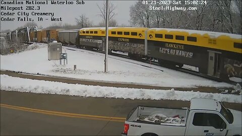 WB L571 Manifest with 2 Ex-Hawkeye Express Cars at Cedar Falls & Iowa Falls, IA on January 21, 2023