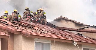 Firefighters respond to 2-alarm apartment fire in central Las Vegas