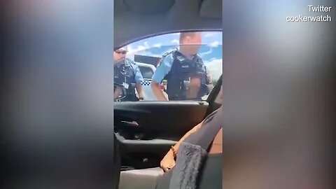 Cops smash car window after woman refused to leave vehicle