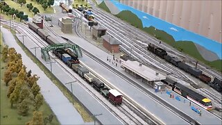 MODEL TRAIN AND MINIATURE RAILROAD - FLY OVER THE MINIATURE SETUP.