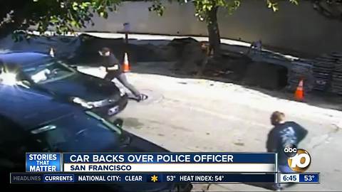 Car backs over police officer in San Francisco