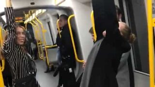 Young woman falls off metro onto platform