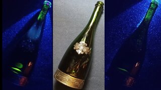 CURIOS for the CURIOUS [87] : Segura Viudas Heredad Cava Bottle under UV Light, Spain