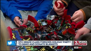 Fifth graders make and donate blankets