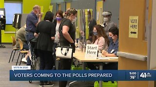 Voters coming to the polls prepared