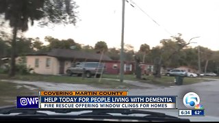 First responders handing out stickers for homes with dementia patients