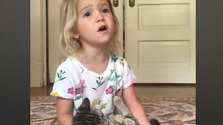 Toddler And Kitten Sing 'Somewhere Over The Rainbow'