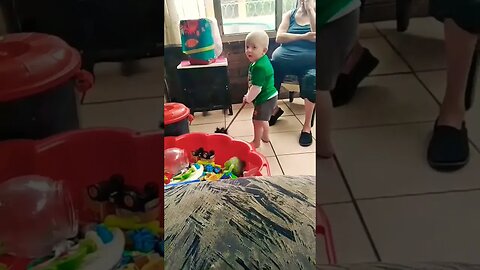 Cute Baby Cleaning The House