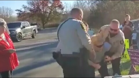 Attorney Maliciously Entrapped; Wrongfully Arrested For Trying to Assist Voters (With Kid in Car!)