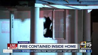 Fire contained inside home in Phoenix