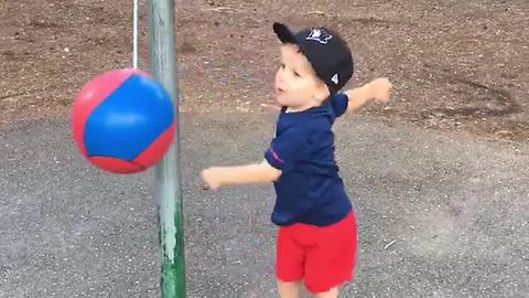 Boy Playing With Tetherball Gets Hit In Face