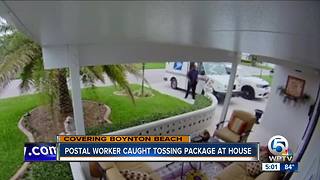 Security camera catches postal worker throwing package