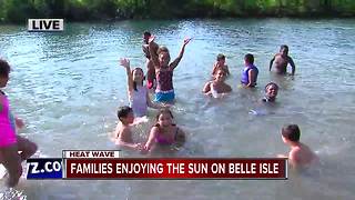Families enjoy the heat on Belle Isle
