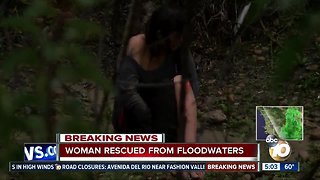 Woman rescued after being caught in dangerous storm water