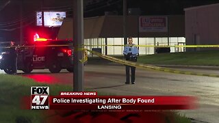 Police investigating after man's body found in Lansing