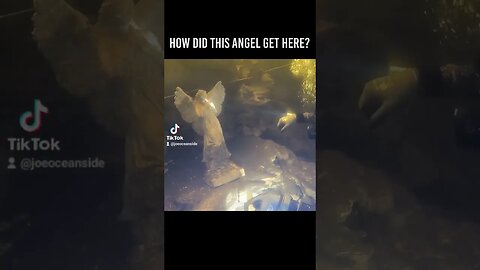 Diver finds angel statue in underwater cavern