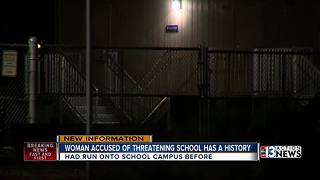 Woman accused of threatening school with ax has a history