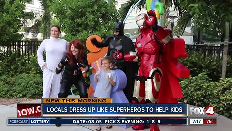 Local superheroes surprise sick kids in Fort Myers
