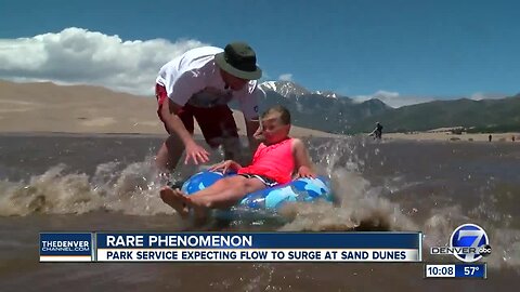 Crowds flock to the Great Sand Dunes to ride the epic Medano Creek surge flow