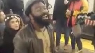 Talented Subway Performer Inspires Passengers To Sing Along