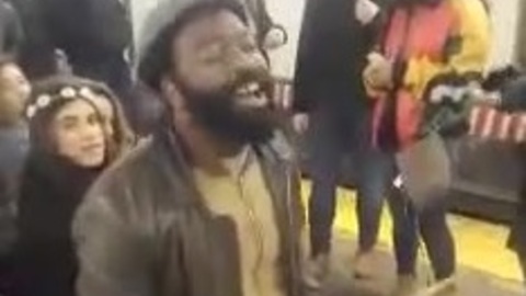 Talented Subway Performer Inspires Passengers To Sing Along